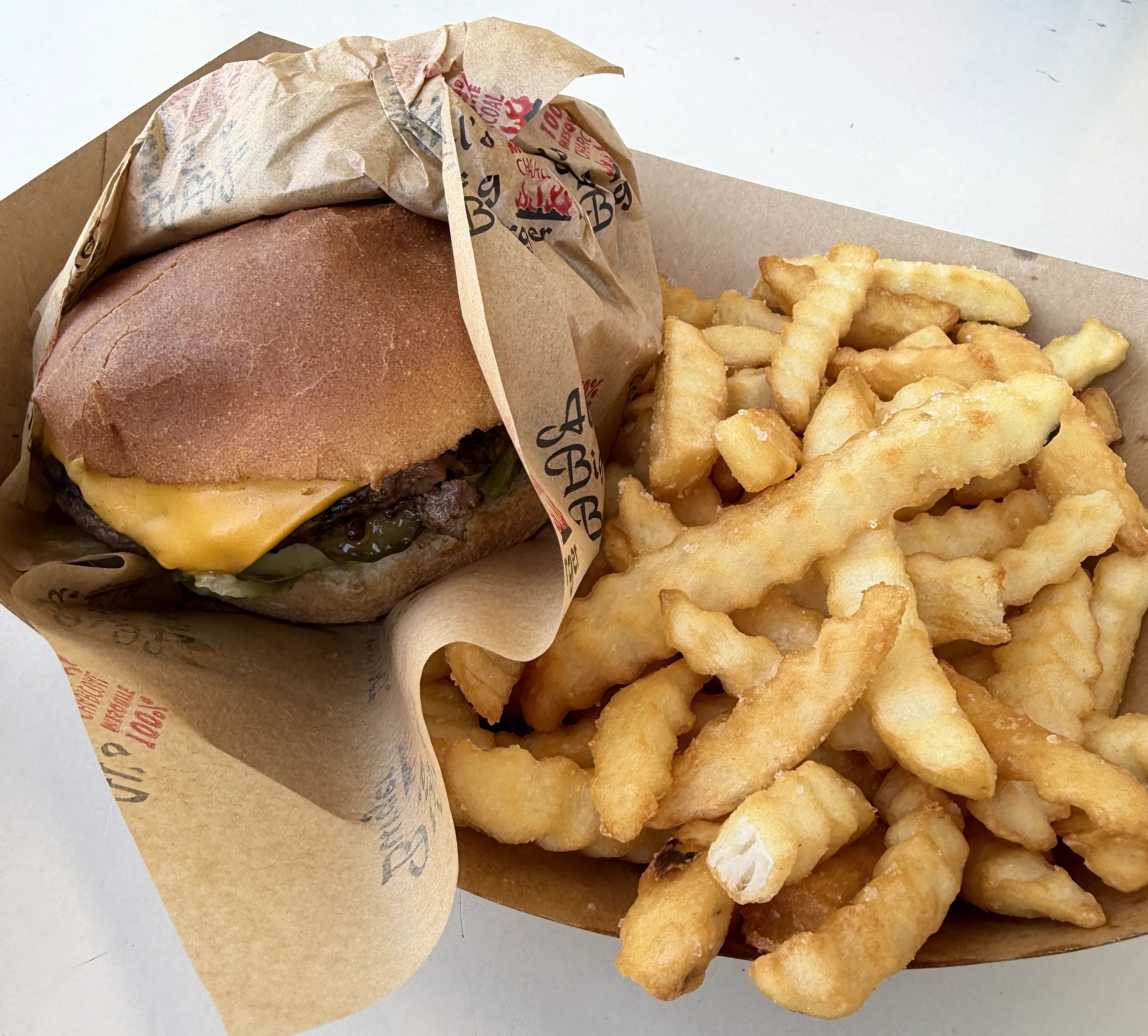 a photo of a burger and fries
